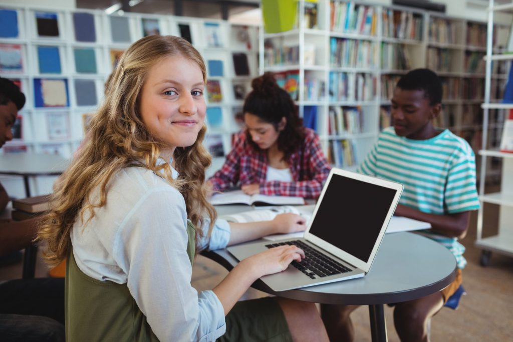 students studying at a library